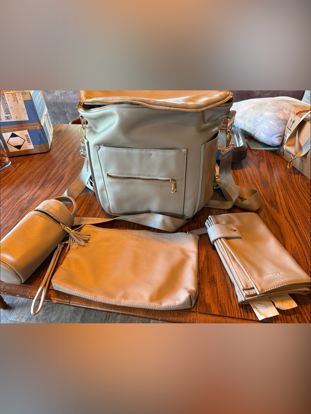 Fawn Design Gray Convertible Baby Backpack with Tan Accents